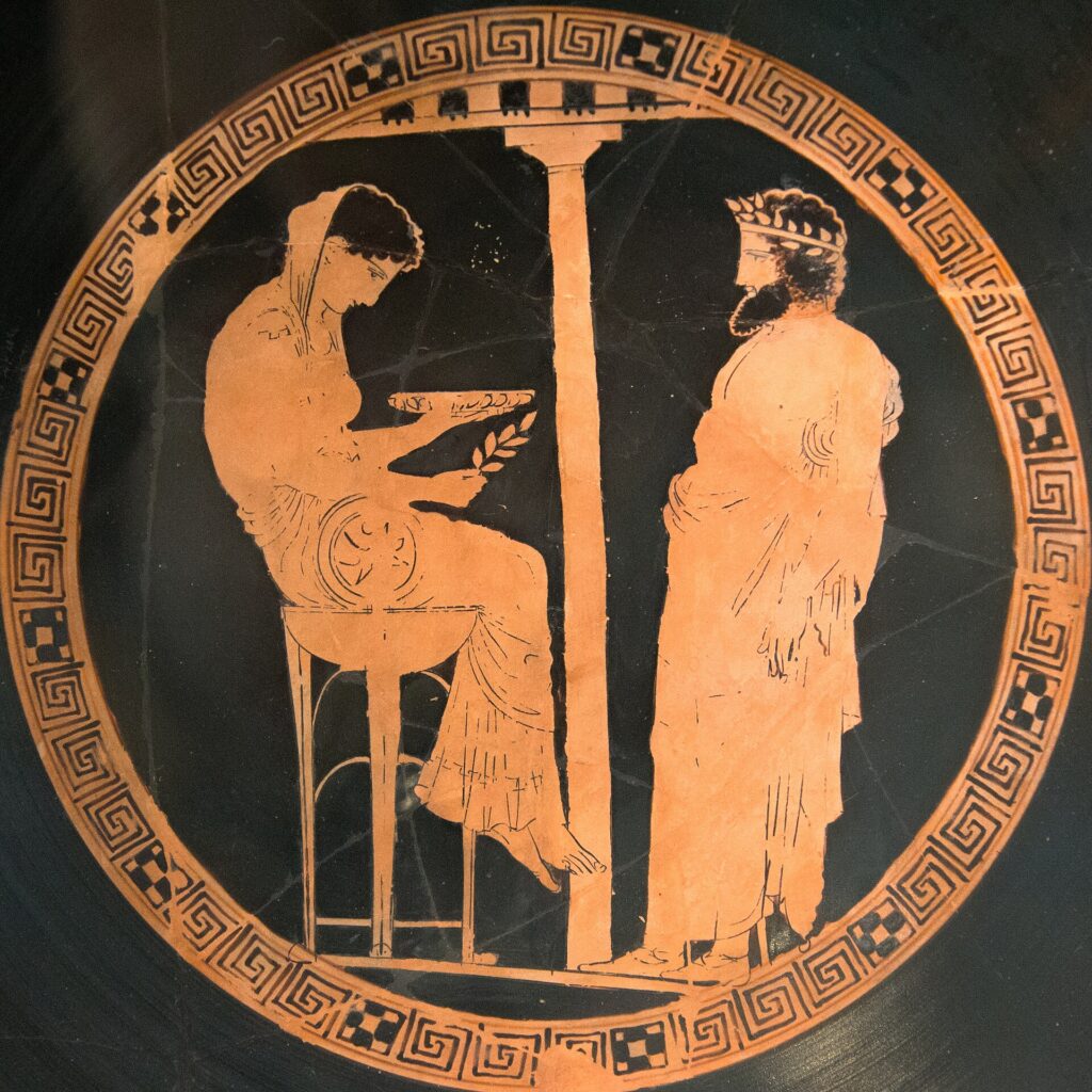 Kylix en céramique à figures rouges d'environ 440 a.C représentant le roi Égée en consultation avec la pythie de Delphes - Auteur inconnu (Altes Museum de Berlin) I Domaine public