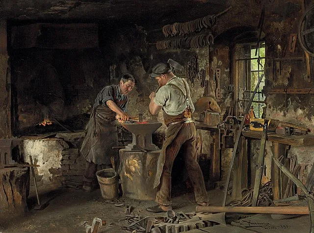 Un forgeron dans une forge en 1900 - Johann Hamza | Domaine public