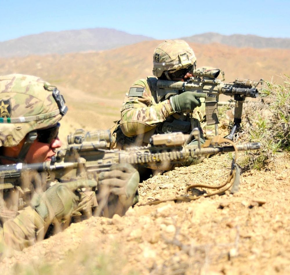 Tireurs américains protégeant un convoi de la police aux frontières afghane, en 2013 - Staff Sgt. Shane Hamann | Domaine public